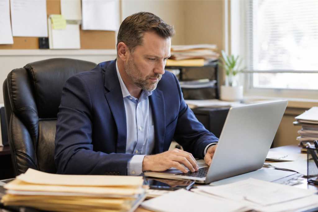 Bail Bondsman Entering Client Information